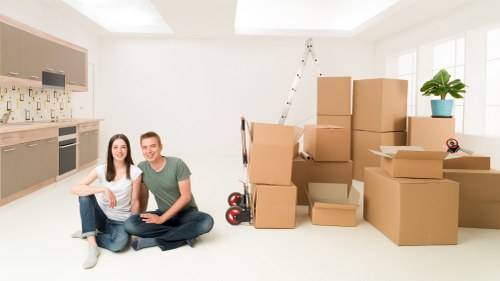Residential move with boxes and furniture in a Kings Cross flat building